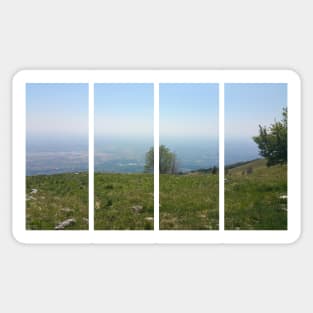 A static shot from the panoramic point Castaldia di Piancavallo; great view with a little mist over Aviano. Beautiful nature in a spring sunny day; no people around Sticker